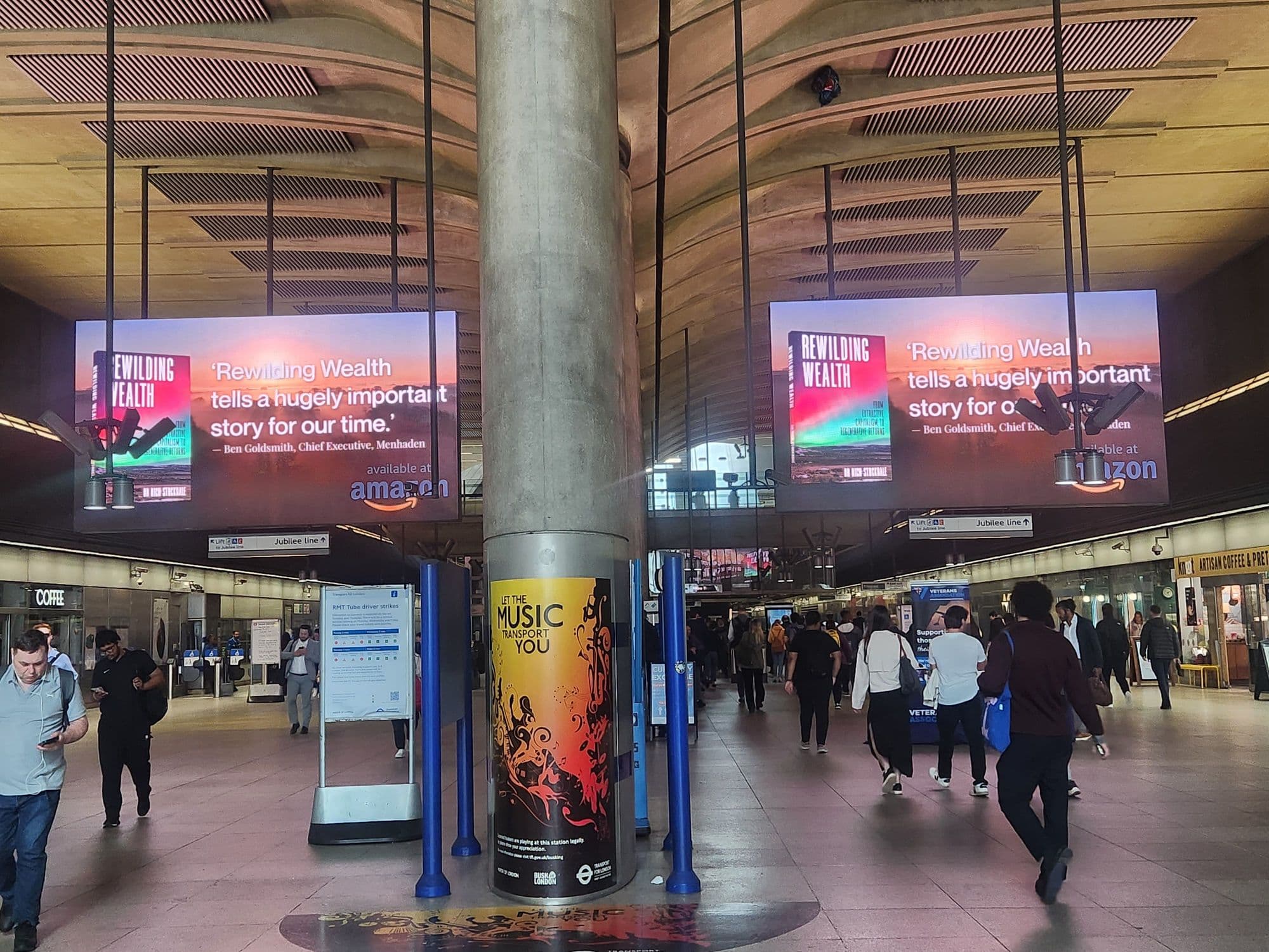 Rewilding Wealth book launch creative on the Canary Wharf Underground Digital Gateway screens