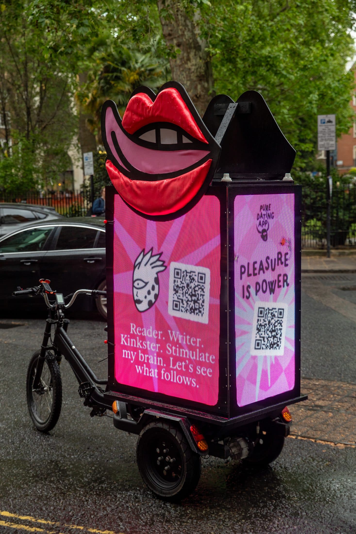 Custom-built 3D lips sculpture mounted on the Pure Digital AdBike