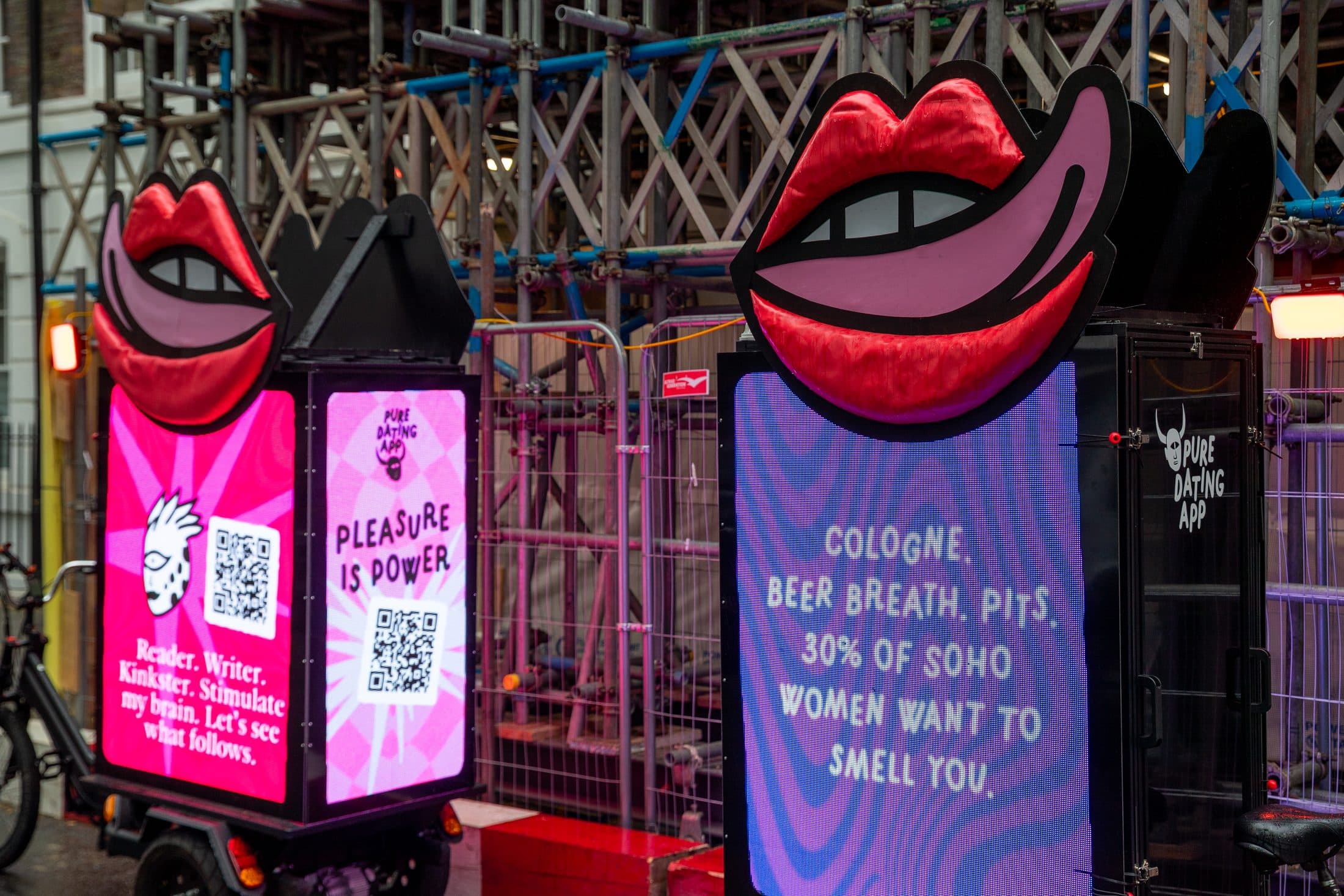 Close-up of the Pure Pleasure is Power creative on the Digital AdBike LED screen