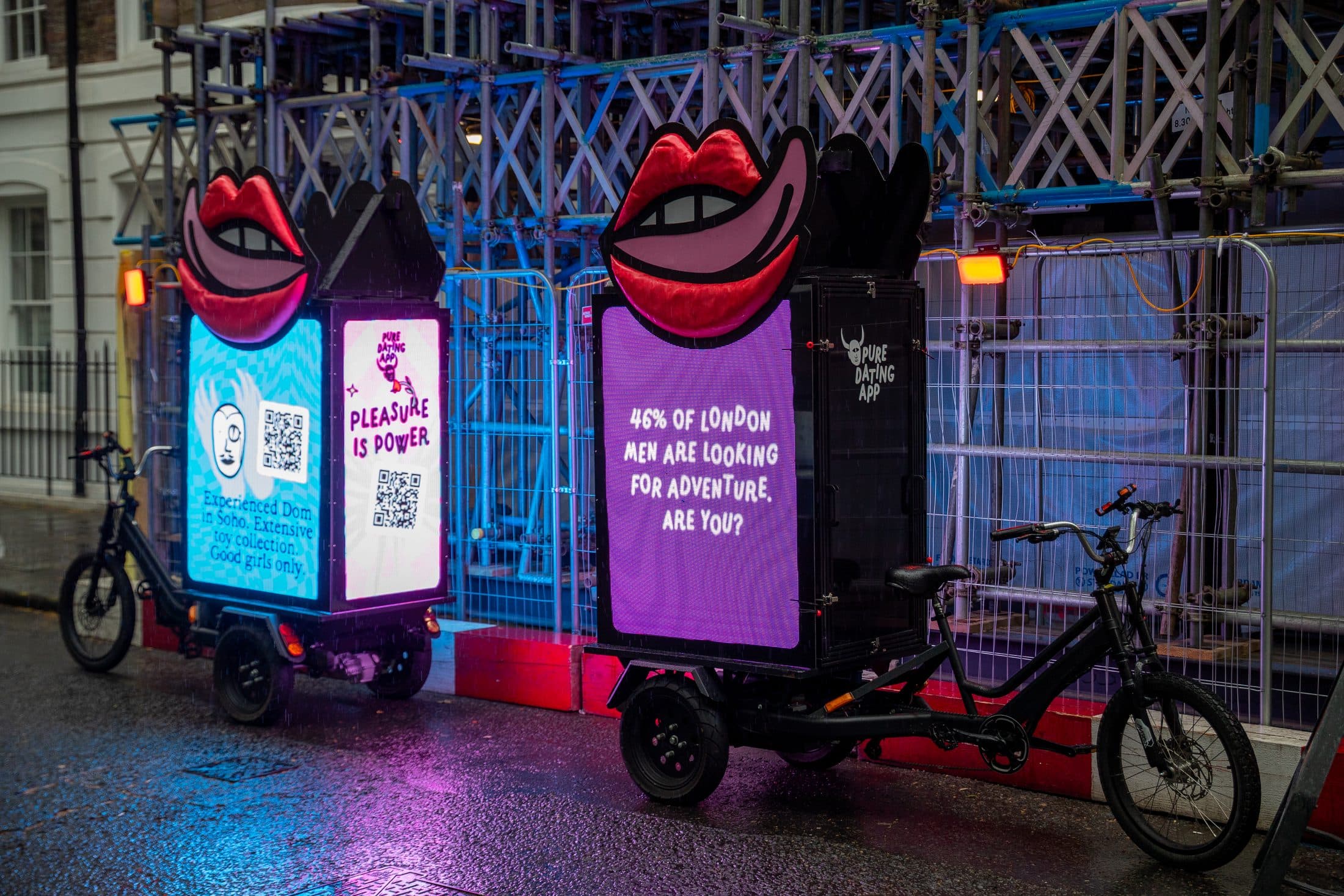 Pure dating app Digital AdBike glowing on a Soho street at night