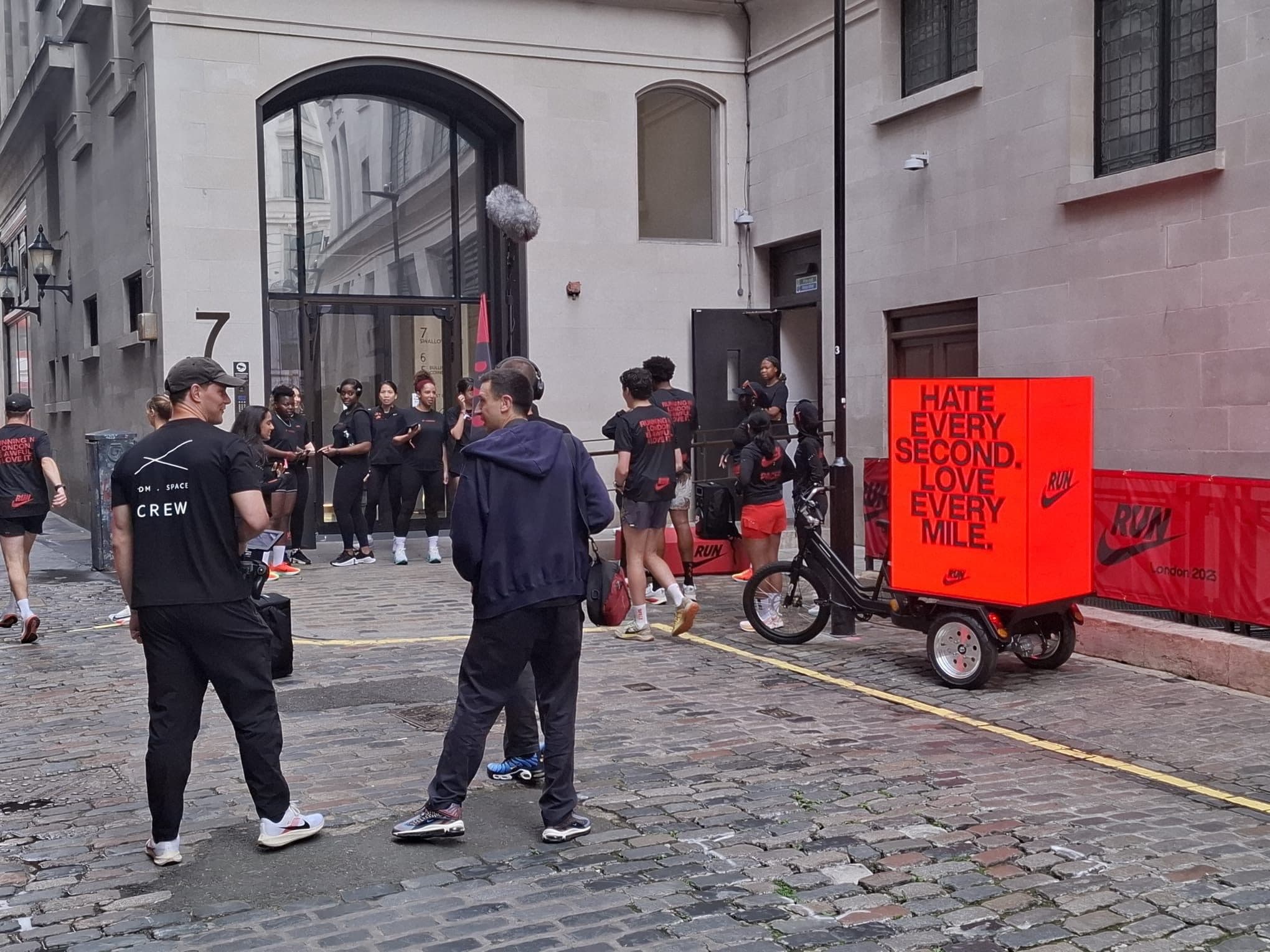 Street level brand activation drawing a crowd in central London
