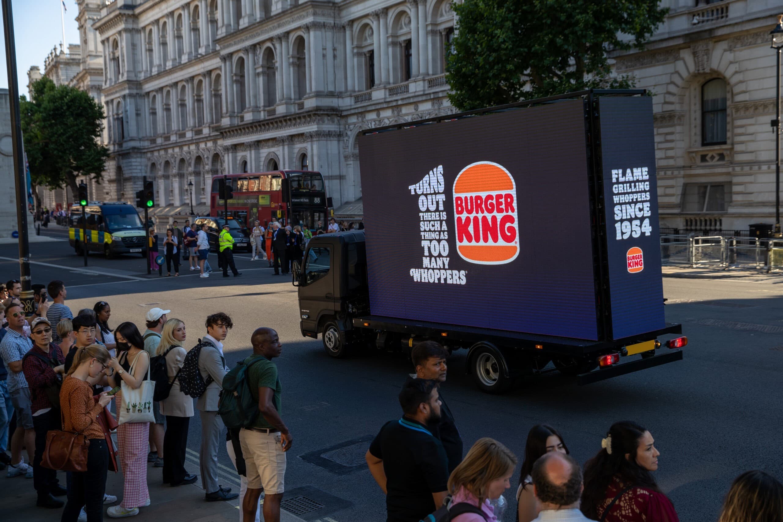 Monster Digital AdVan running a Burger King campaign past Whitehall in London