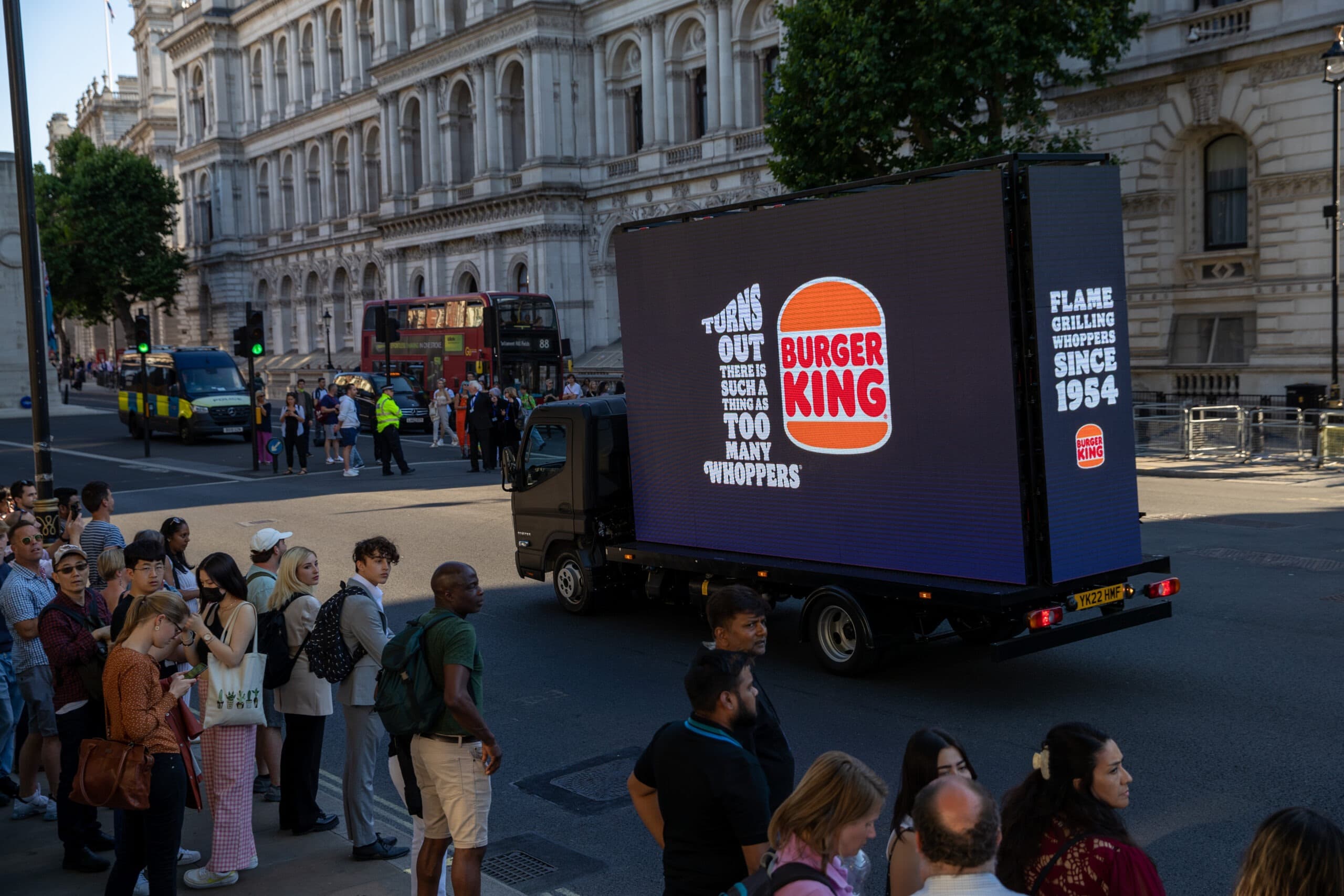 Monster Digital AdVan running a Burger King campaign past Whitehall in London
