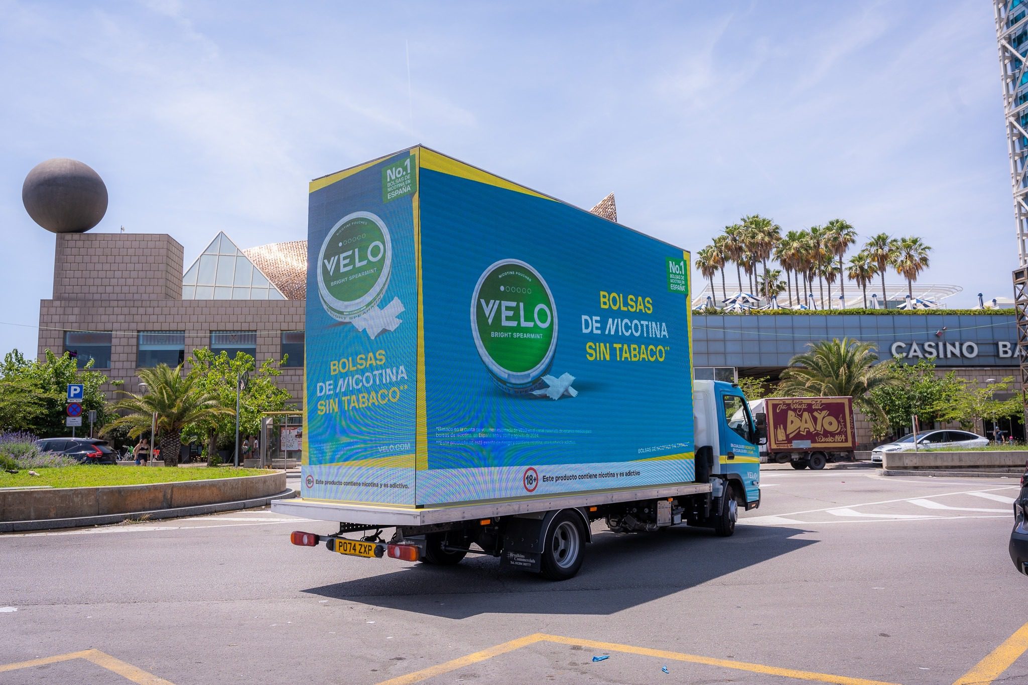 Velo advertising campaign using a digital ad bike and mobile billboard in the city, showcasing LED advertising screens and street advertising boards.