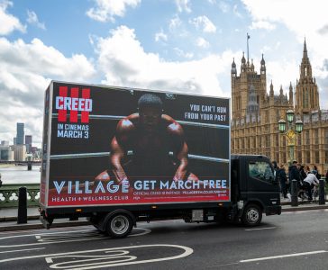 Creed digital ad van campaign - compliant mobile billboard advertising UK